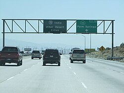 The namesake of the play's title is the "other Desert Cities" freeway sign (center) along eastbound Interstate 10 near the Coachella Valley Web003.jpg