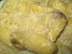Banana in sweet gravy, known as pengat pisang in Malaysia