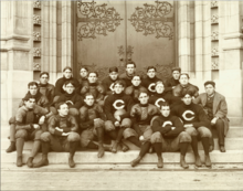 The wishbone-C on the uniforms of the 1898 University of Chicago Maroons football team 1898 University of Chicago Maroons Football Team.png