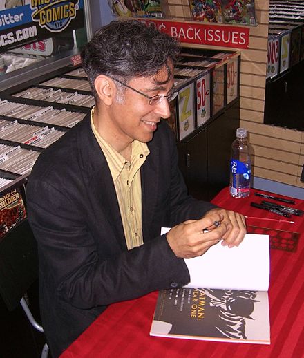 David Mazzucchelli autographing a copy of the 2005 trade paperback in 2012