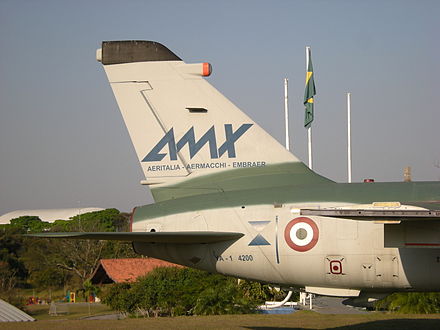 A close-up of the tailfin and rear fuselage of an AMX