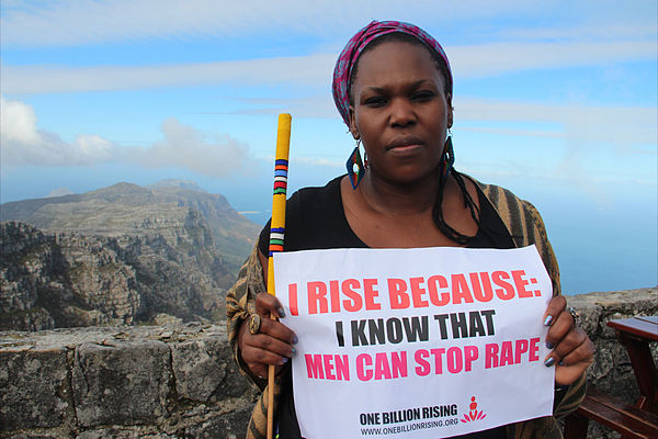South African actress Andrea Dondolo on Table Mountain in Cape Town, as part of One Billion rising, to call for an end to violence against women and girls.