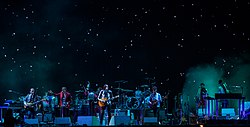 Аркейд Файър на концерт през 2014 г.