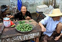 Areca nuts as sold in Hainan, China Areca nut vendor hainan jan 2010.jpg