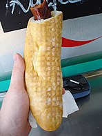 An Austrian "hot dog" can use a hollowed-out baguette as the bread.