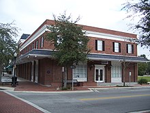 an old two story brick office building