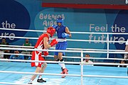 Deutsch: Boxen bei den Olympischen Jugendspielen 2018 Tag 12, 18. Oktober 2018 - Kampf um die Bronzemedaille im Fliegengewicht Mädchen – Timur Merjanow (Usbekistan, rot) schlägt Youssef Ali Karar Ali (Ägypten, blau) 5-0; Ringrichter ist Antonín Gaspar (Tschechien). English: Boxing at the 2018 Summer Youth Olympics on 18 October 2018 – Boy's heavyweight Bronze Medal Bout - Timur Merjanov (Uzbekistan, red) beats Youssef Ali Karar Ali (Egypt, blue) 5-0; Referee is Antonín Gaspar (Czech Republic). Español: Boxeo en los Juegos Olímpicos Juveniles de Verano de 2018 en 18 de octubre de 2018 - Medalla de bronce de peso pesado del muchacho: Timur Merjanov (Uzbekistán, roja) le gana a Youssef Ali Karar Ali (Egipto, azul) 5-0; El árbitro es Antonín Gaspar (Republica checa).