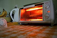 Toaster with red hot heating elements Breadstick - Toaster oven with elements on.jpg