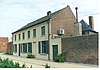 Twee identieke dorpswoningen