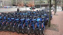 Bicycles awaiting rush hour CB stockpile on E27 & 1st bike plaza 2021 jeh.jpg