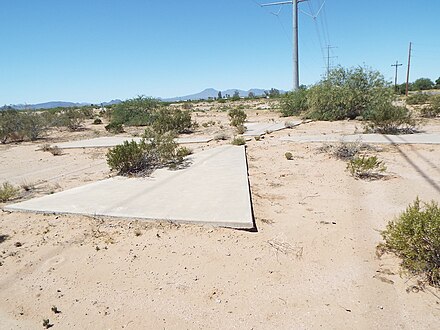 A CORONA Target (Y4-7) is located on the southeast corner of South Montgomery Road and West Corman Road in the City of Casa Grande, Arizona.