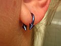 En piercing i øreflippen