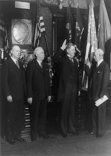 Hurley (second from right) being sworn in as Assistant War Secretary by John B. Randolph. Outgoing Assistant Secretary Charles B. Robbins and Secretary of War James W. Good look on.