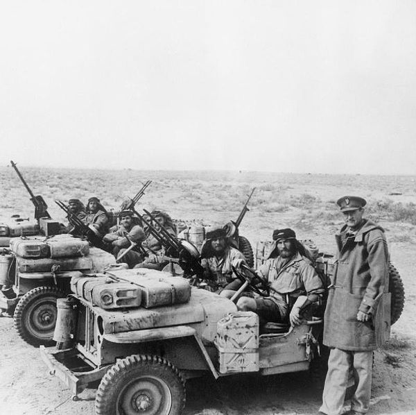 Lieutenant Colonel Stirling with Lieutenant Edward McDonald and other SAS soldiers in North Africa, 1943