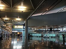 Hallway after the security checking border inside the domestic terminal 2