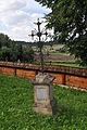 * Nomination Grave near Greek Catholic Church in Czerteż. --CLI 20:49, 11 February 2013 (UTC) * Decline Perspective problems, background is very disturbing, the brown wood crosses the cross of the gravestone. --Tuxyso 21:18, 11 February 2013 (UTC)