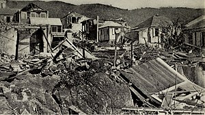 Rubble from homes on a hillside