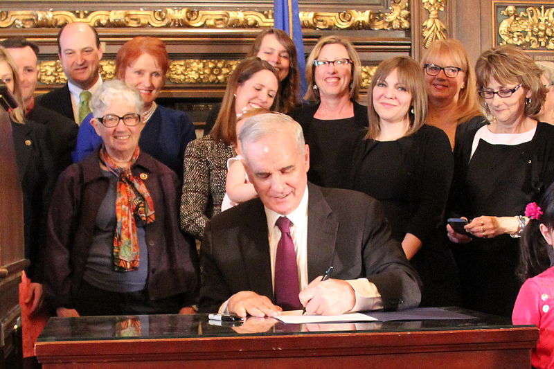 File:Dayton signs Women's Economic Security Act.jpg