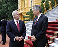 Defense.gov News Photo 101012-F-6655M-019 - Secretary of Defense Robert M. Gates right chats with Australian Defense Minister Stephen Smith during the first Association of Southeast Asian.jpg