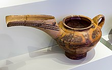 Vasiliki Ware in the characteristic "teapot" shape, vasiliki, EM IIB, AMH EM IIB Vasiliki style teapot from Vasiliki - Herakleion AM 3738 - 01.jpg