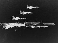 VF-62 F-8Cs fly over the USS Shangri-La in 1968 F-8C Crusaders of VF-62 fly over USS Shangri-La (CVA-38) c1968.jpg