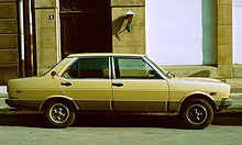 Fiat 131 with plastic dodgem panels in profile.jpg