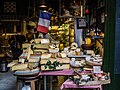 Miniatuur voor Bestand:French cheese stall (Unsplash).jpg