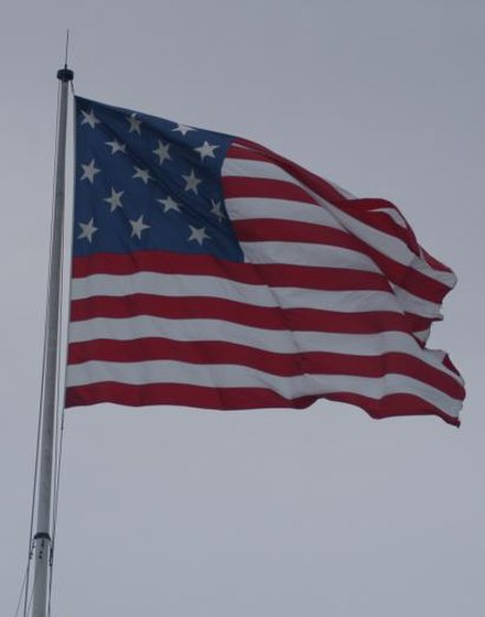 A replica of the 15-star/15-stripe U.S. flag that currently flies over Fort McHenry