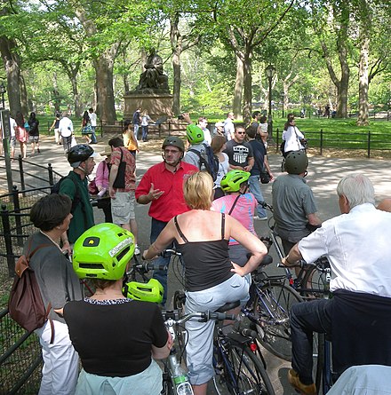 Cyclotouring group stopping for a lecture in Central Park