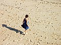 Alvesgaspar: Girl walking in the beach. Porto Covo, west coast of Portugal.