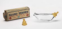 Feeder bottle with valve and teat, Glaxo Laboratories, Greenford, Middlesex Glaxo feeder bottle with packaging.jpg