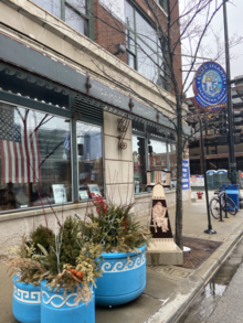 Outside of the restaurant Greek Islands, blue pots painted with famous Greek patterns, such as the Greek key, adorn the sidewalks of Greektown. GreekartinspiredPotsinGreektown.png