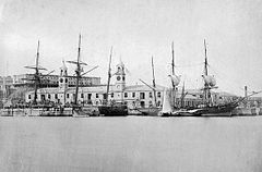 HMS Vixen (left) and the barque Nightwatch (right) at the Royal Navy Dockyard between 1867 and 1873