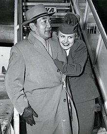 Hayakawa with a flight attendant in New York, c. 1960