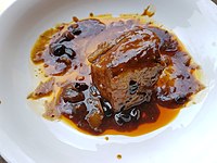 Humbà is a braised pork dish from the Visayas. In Cebu, it is primarily served in Ronda.