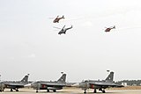 IAF helicopters HAL Dhruv and Mil Mi-17 flypast during Squadron 18 induction ceremony.