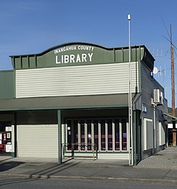 view of single storey wooden building