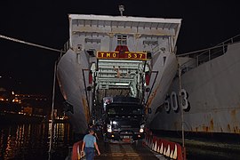 Indonesian military truck carrying relief for 2018 Palu tsunami embarks into KRI Teluk Manado 2.jpg