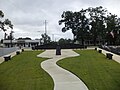 Jackson Veterans Memorial Park (looking at eternal flame and South face of North wall).JPG