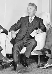 In November 1932, during parliamentary question time, Prime Minister Joseph Lyons (pictured) was mockingly asked by Lang Labor MP Rowley James whether a medal would be struck for the soldiers. Joseph Lyons seated.jpg