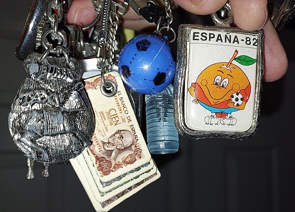 Naranjito, the official mascot of the 1982 tournament, is featured in this vintage collection of Spanish keychains.