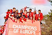 Woodburn (centre) celebrating Liverpool's 2019 UEFA Champions League triumph with his teammates LFC Parade 2019 01.jpg