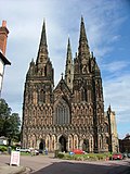 Lichfield Cathedral – three masonry spires, the crossing tower being taller.