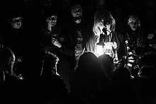 Lingua Ignota (pictured) performing at the Roadburn Festival in 2019. Lingua Ignota @ Roadburn Festival 2019-04-12 086.jpg