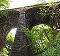 A derelict viaduct known as Lobb Ghyll, built by the Midland Railway in 1888 to connect Ilkley and Skipton.