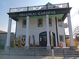Front of Colonial Gardens main building, which houses the restaurant The B.A. Colonial Louisville Colonial Gardens front close-up.jpg