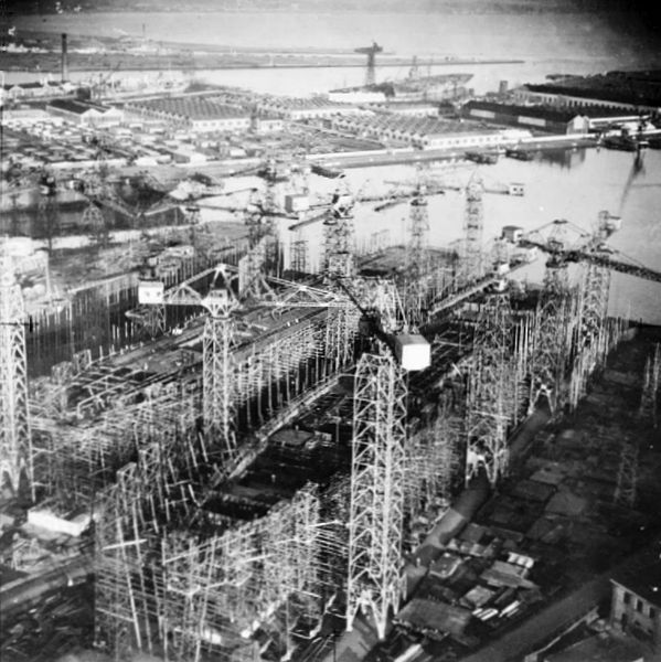 Magnificent (left) and Powerful under construction at Harland and Wolff in 1944