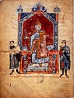 Im Dedikationsbild sitzt Mathilde auf einem Thron unter einem hohen Baldachin zwischen einem Mönch und einem Ritter. Sie hält in ihrer rechten Hand ein Pflanzenzepter.