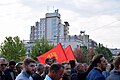 Men with UÇK flags during protest Prishtina.jpg