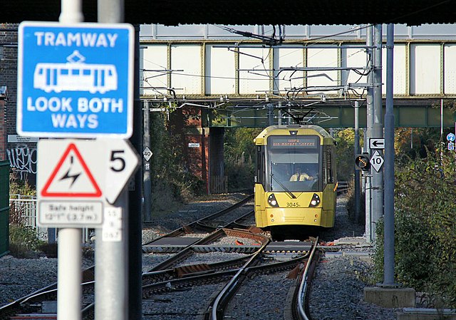 A M5000 tram approaching East Didsbury.